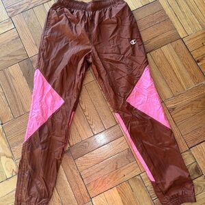 Champion track pants in Rusty Brown/ Pink paneling - size small